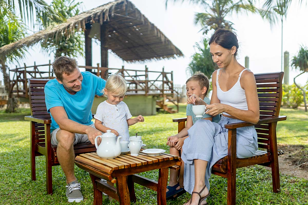 Family enjoying tea at resort